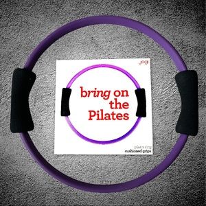 Pilates ring with cushion grips